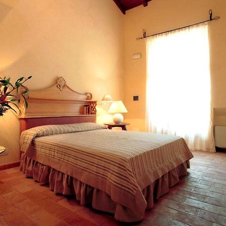 Agriturismo Lecanfore Pensionat Castel di Leva Værelse billede